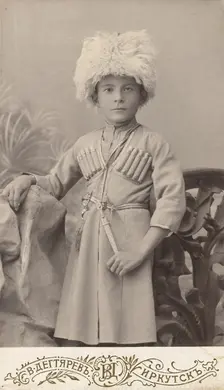 Portrait of a boy Leonid in a Caucasian national costume, end of 19th century. Creator: VV Degtiarev
