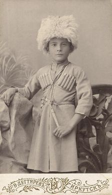 Portrait of a boy Leonid in a Caucasian national costume, end of 19th century. Creator: VV Degtiarev