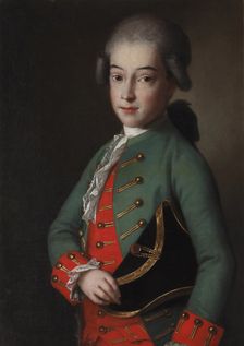 Portrait of a boy wearing a green kaftan