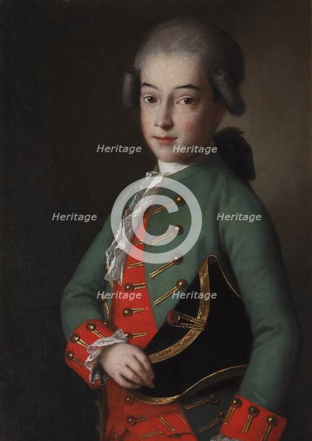 Portrait of a boy wearing a green kaftan.