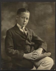 Portrait of a Boy with Cap on Knee, 1907-1943. Creator: Louis Fleckenstein