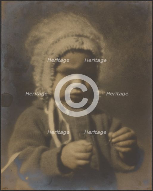 Portrait of a Child Wearing a Bonnet, 1907-1943. Creator: Louis Fleckenstein.