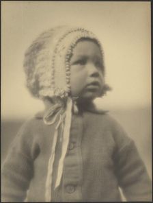 Portrait of a Child Wearing a Bonnet, 1907-1943. Creator: Louis Fleckenstein
