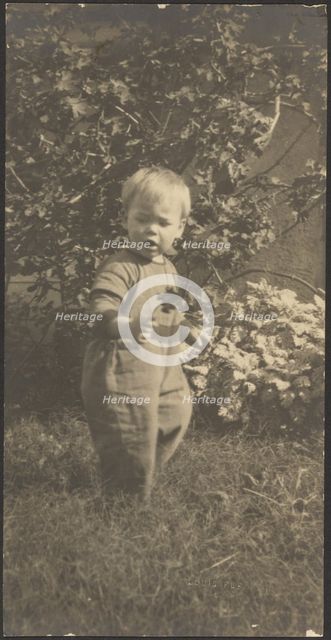 Portrait of a Child in Garden, 1907-1924. Creator: Louis Fleckenstein.