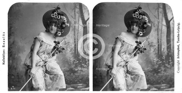 Portrait of a costumed woman, early 20th century.Artist: Aristophot
