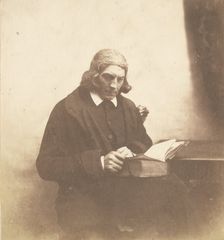 Portrait of a Clergyman with a Book, about 1852-1856. Creator: Roger Fenton