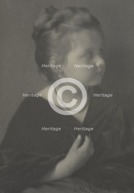Portrait of a girl with a necklace clasping a shawl, c1900. Creator: Alice Austin.