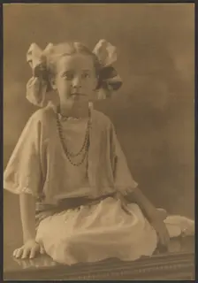 Portrait of a Girl with Big Bows, 1907-1943. Creator: Louis Fleckenstein