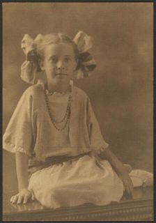 Portrait of a Girl with Big Bows, 1907-1943. Creator: Louis Fleckenstein
