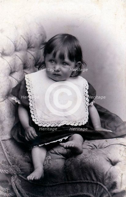 Portrait of a little girl in a big chair, c1910. Creator: Unknown.