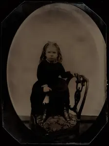 Portrait of a Little Girl Standing on a Chair, 1870s. Creator: Unknown