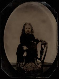 Portrait of a Little Girl Standing on a Chair, 1870s. Creator: Unknown