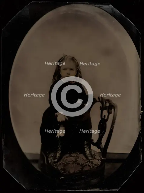 Portrait of a Little Girl Standing on a Chair, 1870s. Creator: Unknown.