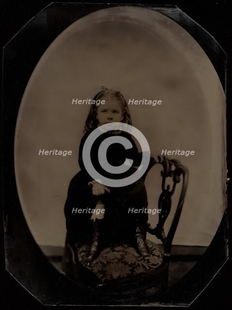 Portrait of a Little Girl Standing on a Chair, 1870s. Creator: Unknown.