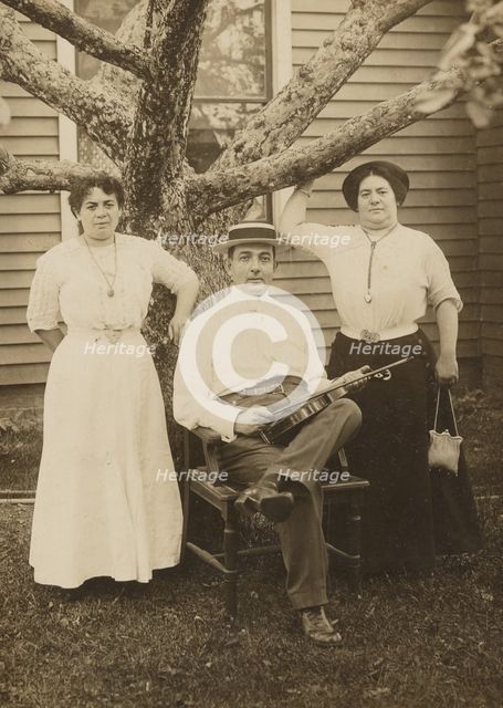 Portrait of a man and two women, about 1890-1900. Creator: Unknown.