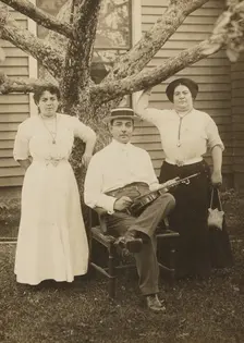 Portrait of a man and two women, about 1890-1900. Creator: Unknown