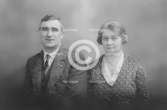 Portrait of a man and woman, c1935. Creator: Kirk & Sons of Cowes.