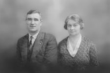 Portrait of a man and woman, c1935. Creator: Kirk & Sons of Cowes