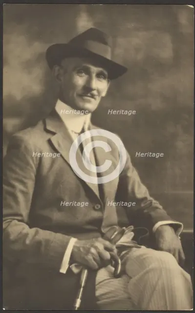 Portrait of a Man Holding Cane and Gloves, 1907-1943. Creator: Louis Fleckenstein.