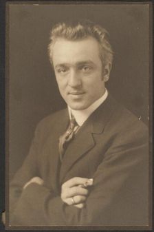 Portrait of a Man Holding Cigar, 1907-1924. Creator: Louis Fleckenstein