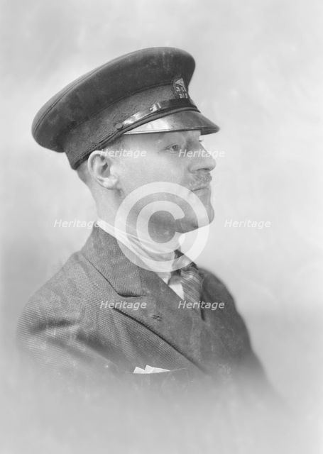 Portrait of a man in uniform, c1935. Creator: Kirk & Sons of Cowes.