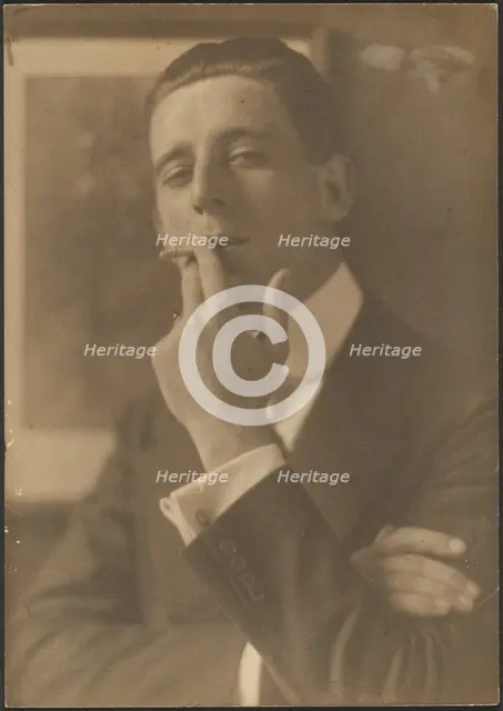 Portrait of a Man Smoking Cigarette, 1907-1943. Creator: Louis Fleckenstein.