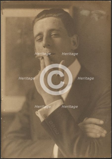 Portrait of a Man Smoking Cigarette, 1907-1943. Creator: Louis Fleckenstein.
