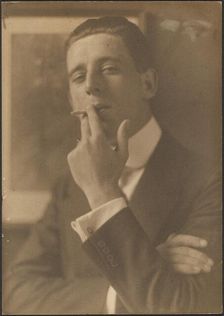 Portrait of a Man Smoking Cigarette, 1907-1943. Creator: Louis Fleckenstein