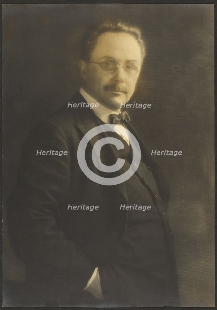 Portrait of a Man Standing with Hand in Pocket, 1907-1943. Creator: Louis Fleckenstein.