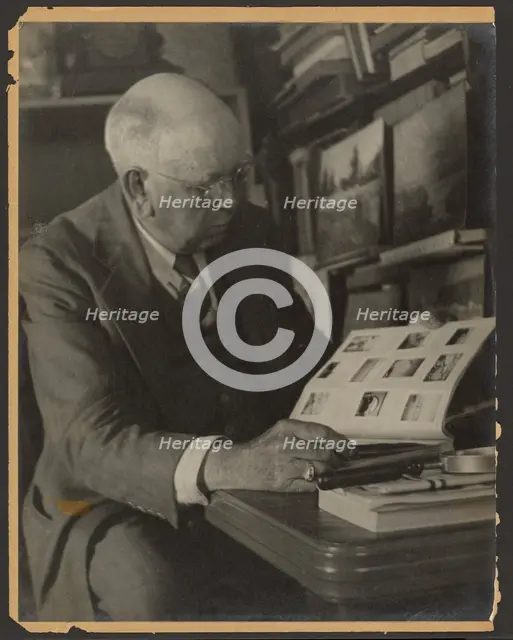 Portrait of a Man Reading Magazine, 1907-1943. Creator: Louis Fleckenstein.