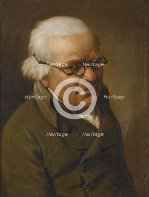 Portrait of a man wearing glasses.