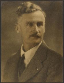 Portrait of a Man with White Lapel Pin, 1907-1943. Creator: Louis Fleckenstein