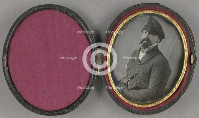 Portrait of a man with a busy moustache and goatee, wearing an angled cap, about 1850. Creator: Unknown.