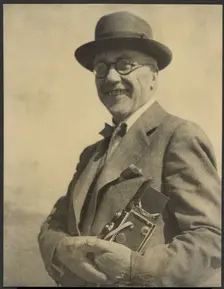 Portrait of a Man with a Camera, 1895-1943. Creator: Louis Fleckenstein
