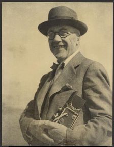 Portrait of a Man with a Camera, 1895-1943. Creator: Louis Fleckenstein