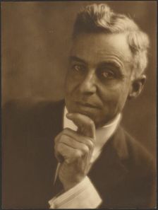 Portrait of a Man with Chin in Hand, 1907-1943. Creator: Louis Fleckenstein
