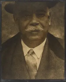 Portrait of a Man with Hat Brim, 1907-1943. Creator: Louis Fleckenstein