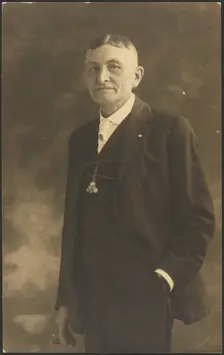 Portrait of a Man with Ornate Watch Fob, 1907-1943. Creator: Louis Fleckenstein