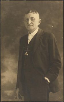Portrait of a Man with Ornate Watch Fob, 1907-1943. Creator: Louis Fleckenstein