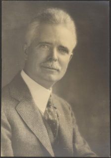 Portrait of a Man with Spotted Tie, 1907-1943. Creator: Louis Fleckenstein