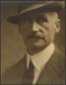 Portrait of a Man with Straw Hat, 1907-1943. Creator: Louis Fleckenstein