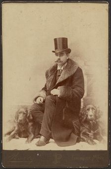 Portrait of a Moustachioed Seated Man in Top Hat and Winter, Fur-Collared Coat..., about 1890. Creator: Lewis Peavey
