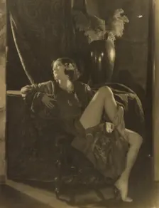 Portrait of a Reclining Woman in a Suggestive Pose, about 1922. Creator: Francis Joseph Bruguiere