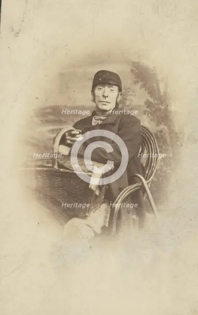 Portrait of a Seated Man with Basket, late 19th century. Creator: Unknown.