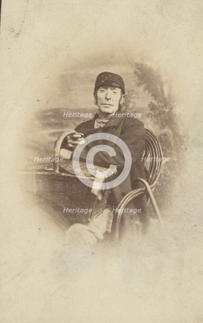 Portrait of a Seated Man with Basket, late 19th century. Creator: Unknown.