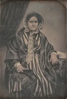 Portrait of a Seated Middle-aged Woman in Bonnet, about 1850. Creator: Unknown