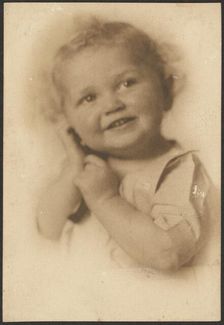 Portrait of a Smiling Child, 1907-1943. Creator: Louis Fleckenstein