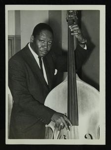 Portrait of American double bass player Curtis Counce, c1950s. Creator: Denis Williams