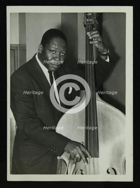 Portrait of American double bass player Curtis Counce, c1950s. Creator: Denis Williams.