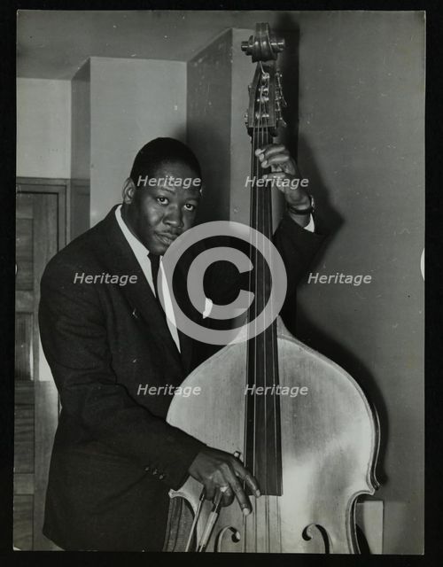 Portrait of American double bass player Curtis Counce, c1950s. Creator: Denis Williams.